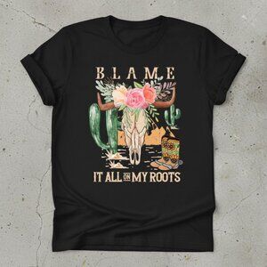 Western Cow Skull Floral Graphic Tee – “Blame It All On My Roots”